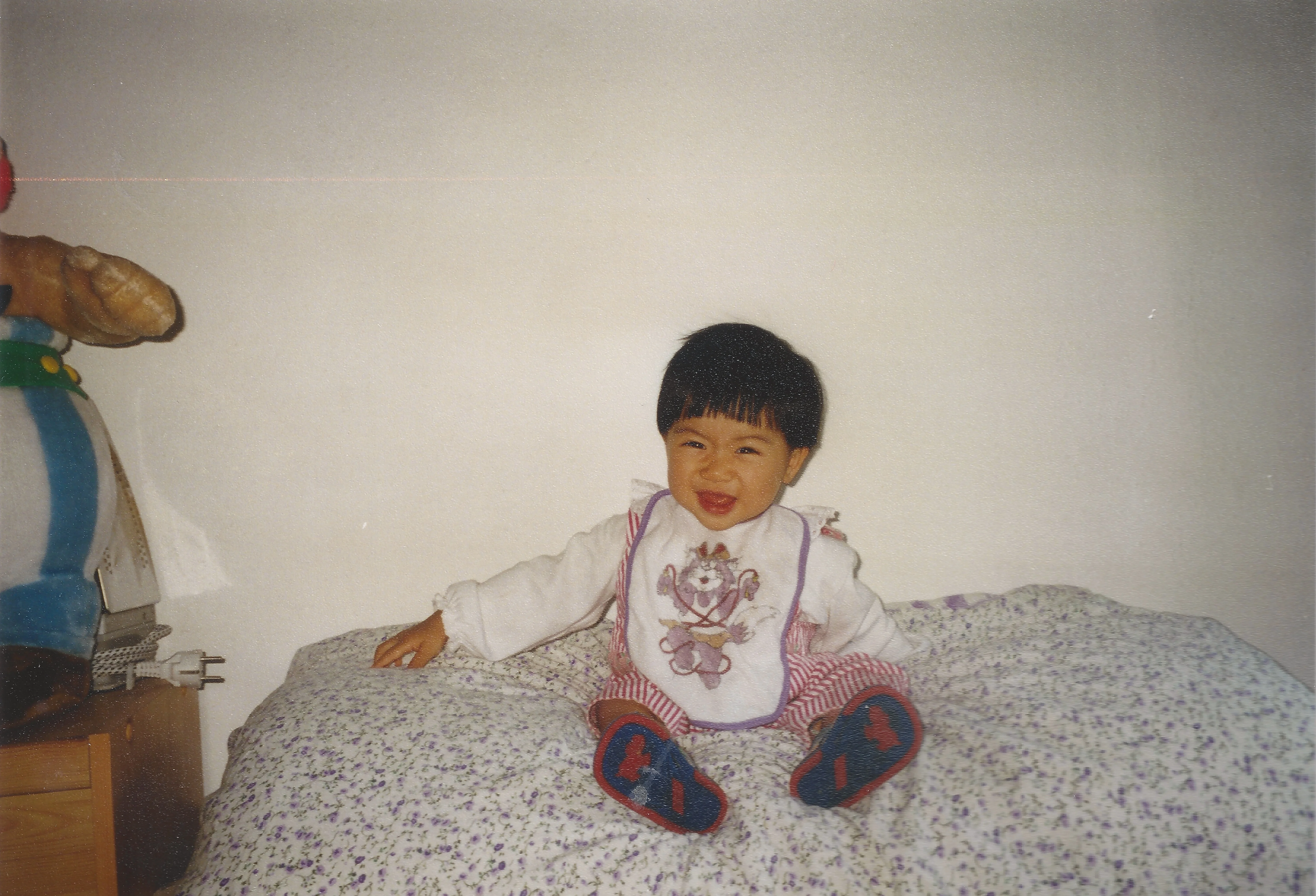 Jenny smiling as a baby